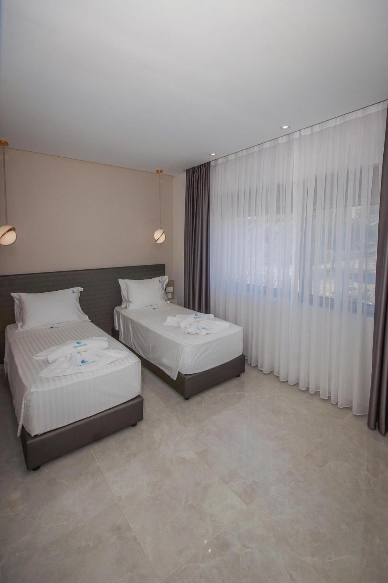 Aquamarine Luxury Suites Archangelos  Eksteriør bilde